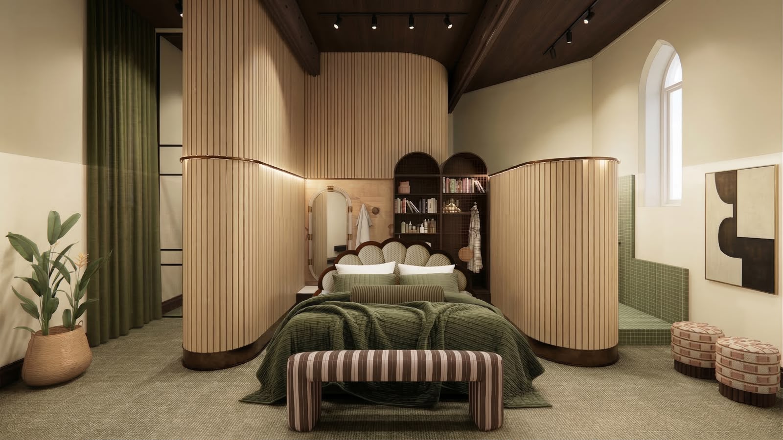 A tower suite — King bed with curved bedhead between fluted timber screens, arched heritage window